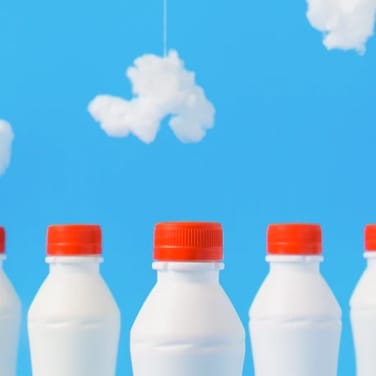 milk bottles with sky background