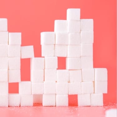 sugar cubes with pink background